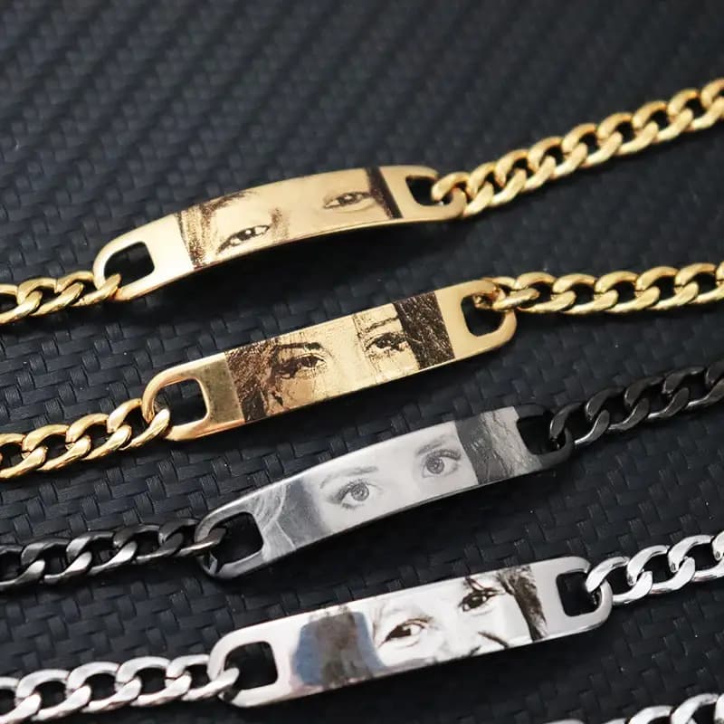 Gold, silver and dark chain finishes with engraved eye plates